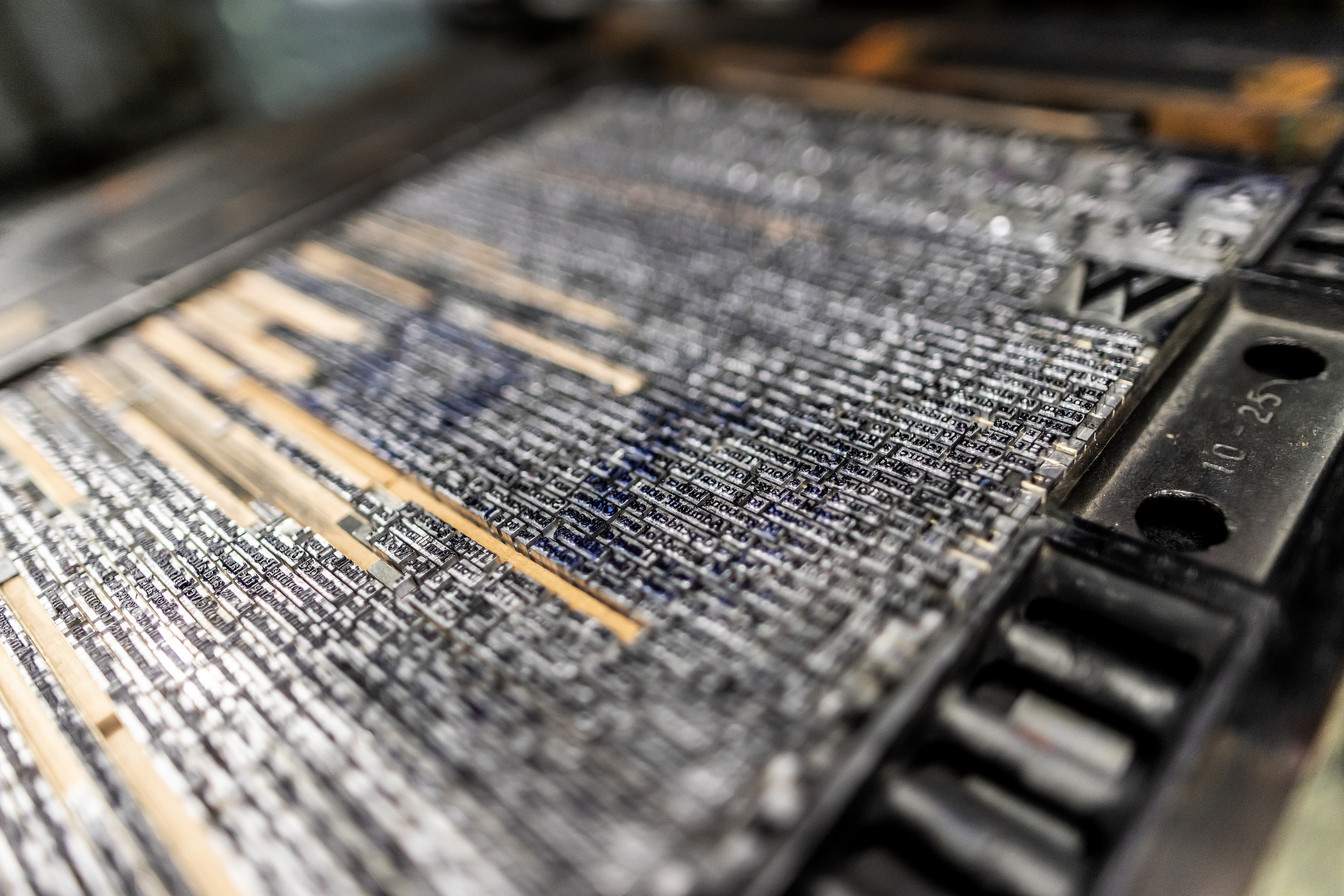 close up image of typesetting with ink