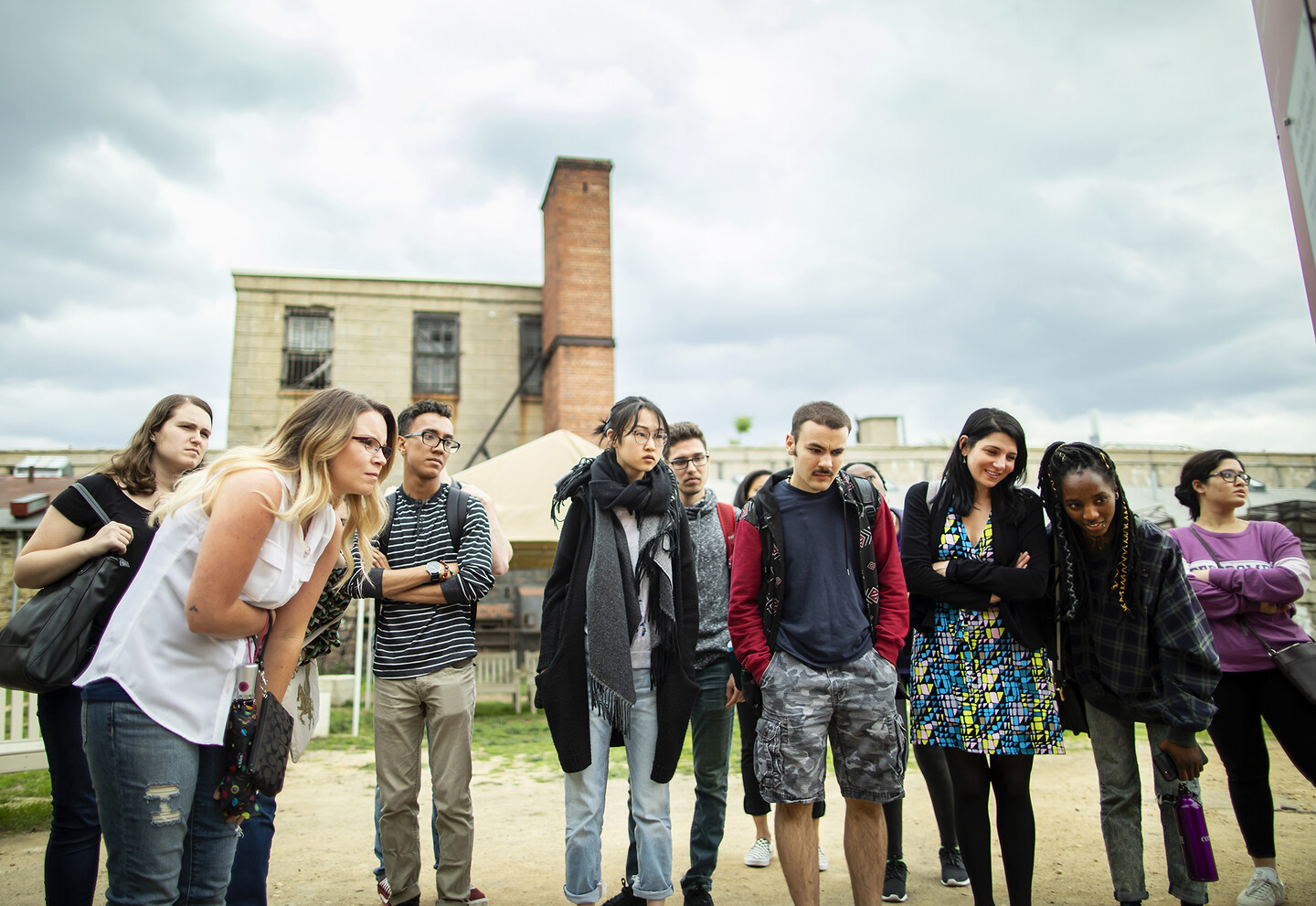 Coren Apicella (third from right), an assistant professor of Psychology at Penn, lead the program, which spent one week on social and behavioral sciences and another on language science and technology. 
