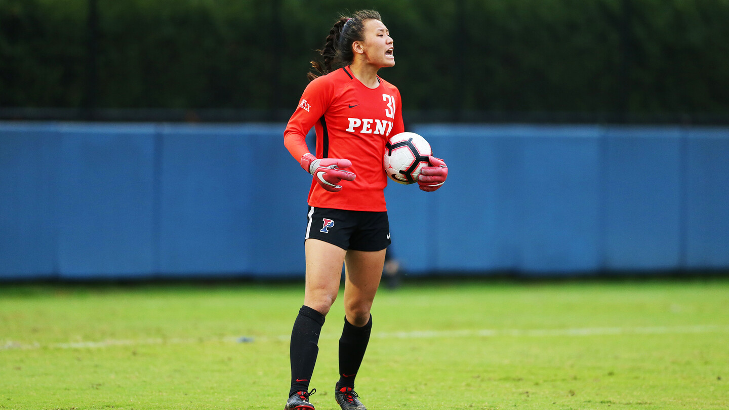 Kitty Qu holds the ball during the Princeton game