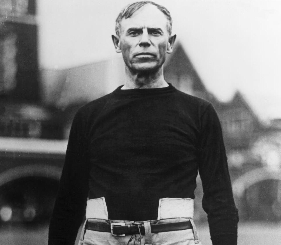 Coach John Heisman stands on Clemson's Bowman Field