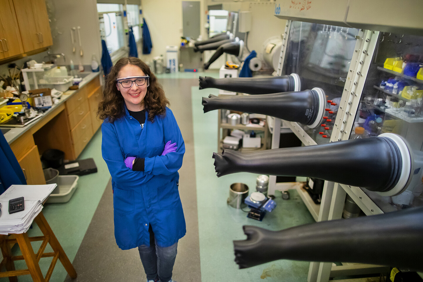 grant posing in front of glove boxesGrant has published over ten papers during her time as a PhD student in the Department of Chemistry. Her latest paper is the result of work that was spread across nearly three years, from the initial study design to publishable results.  inside a lab