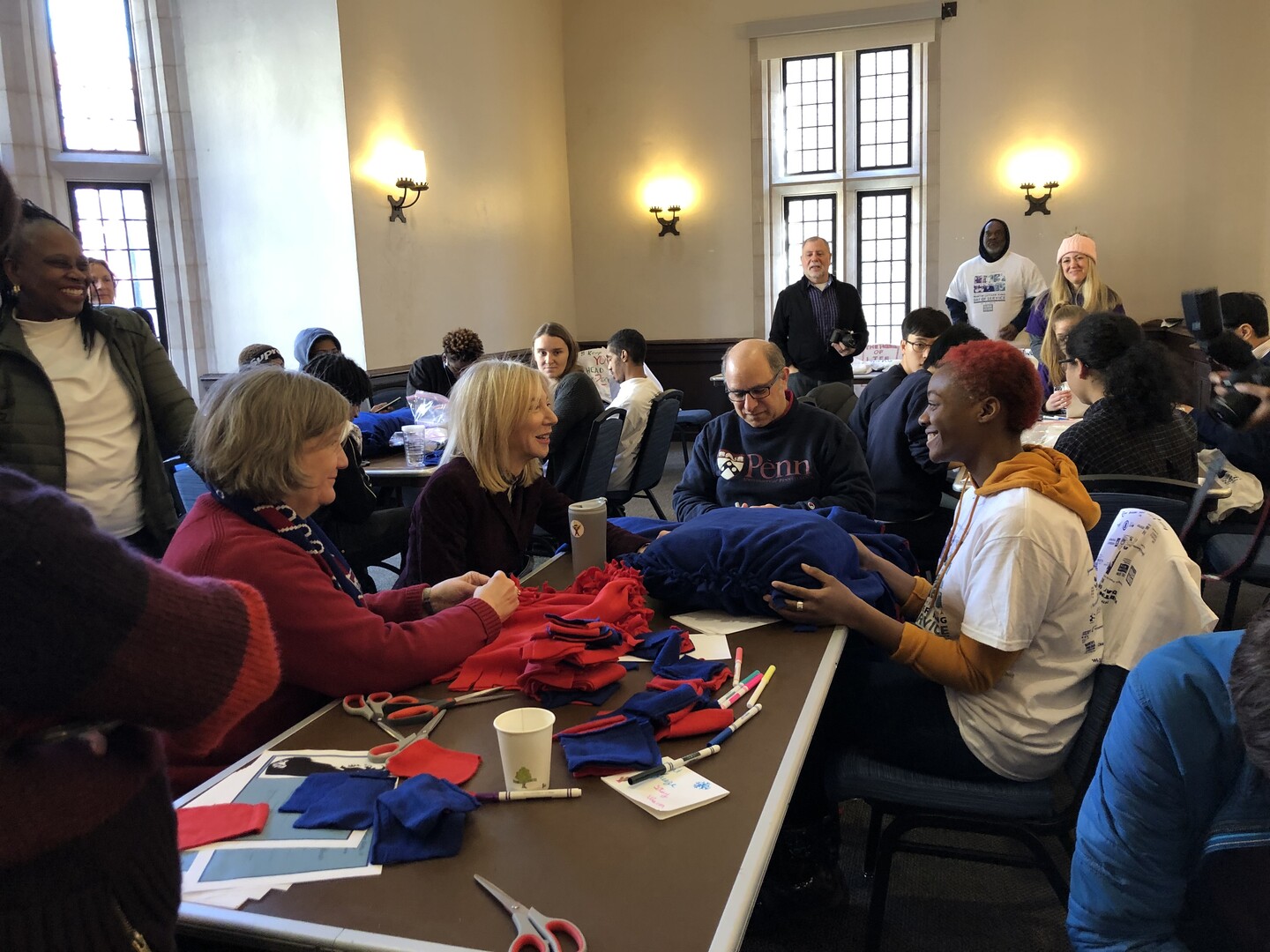 Amy Gutmann talking to adults