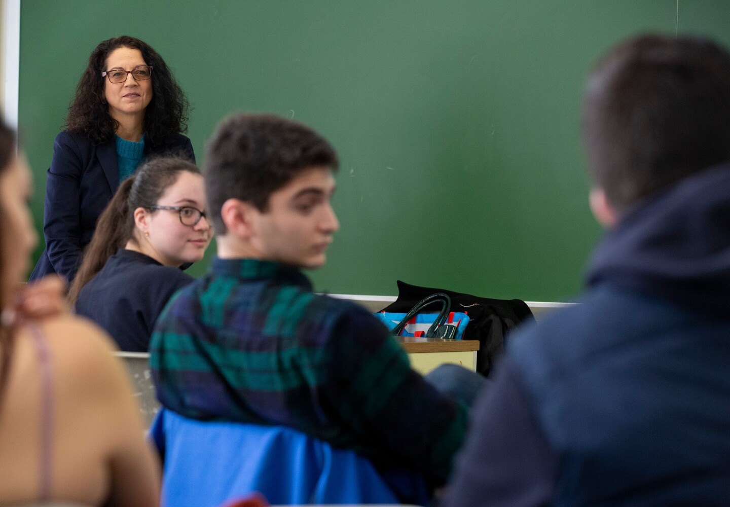 Kristen Ghodsee listening to students in class