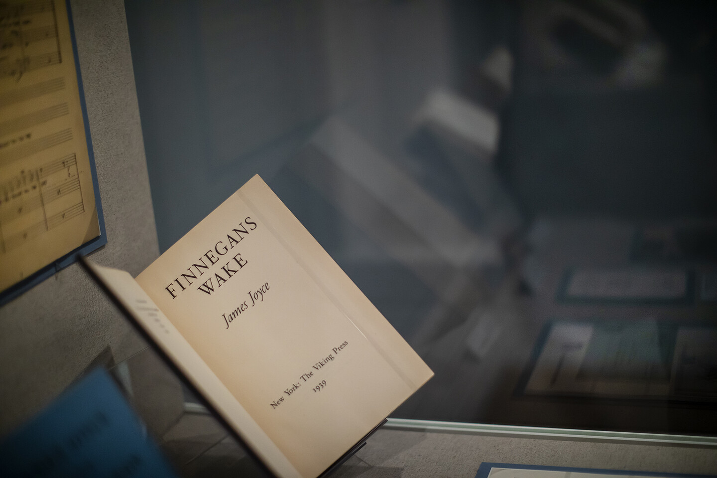 Book in display case open to the title page Finnegans Wake. 