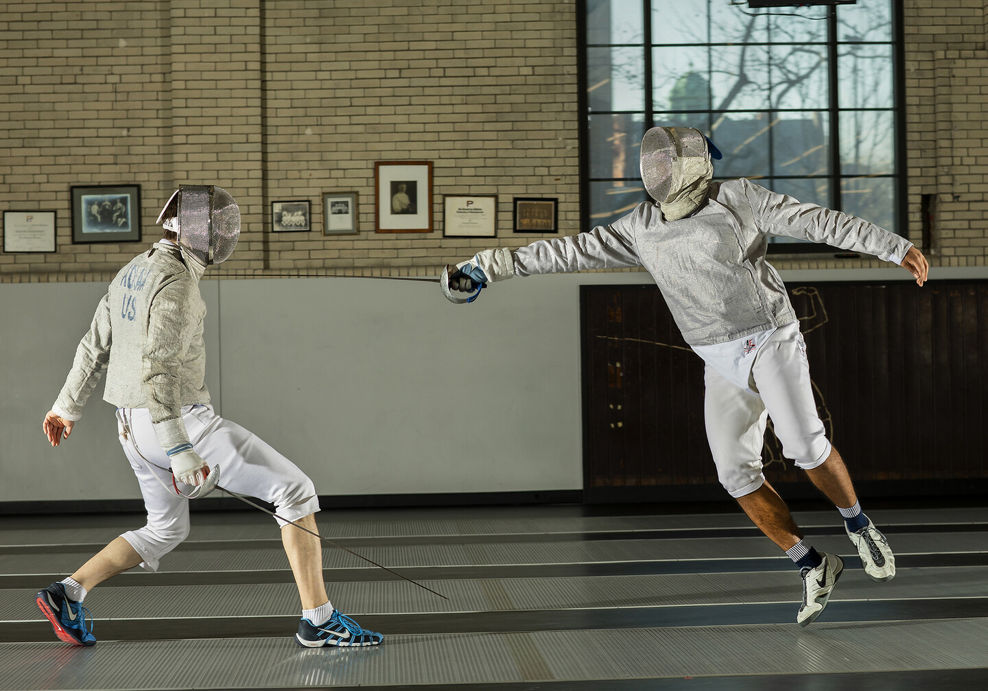 Julian Merchant, right, practices with a teammate at Hutchinson Gym.