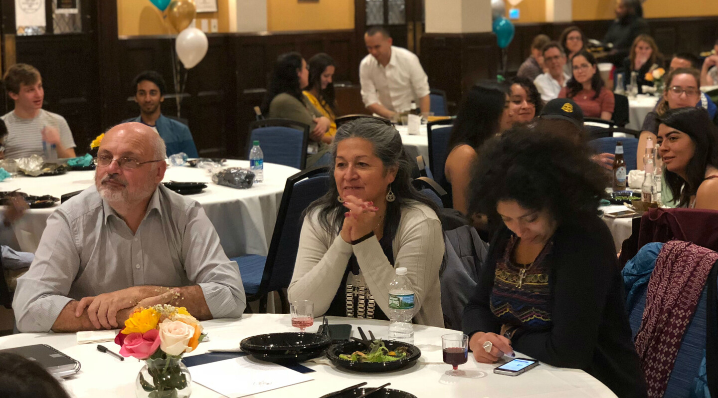 Three people at a table
