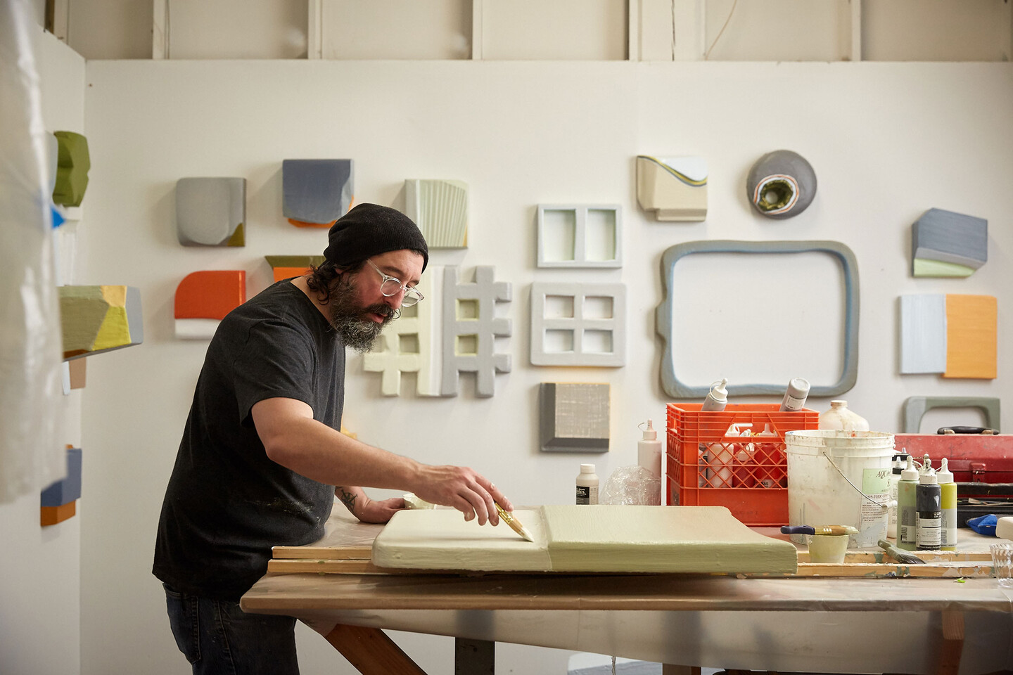 Lucas Kelly painting with a brush