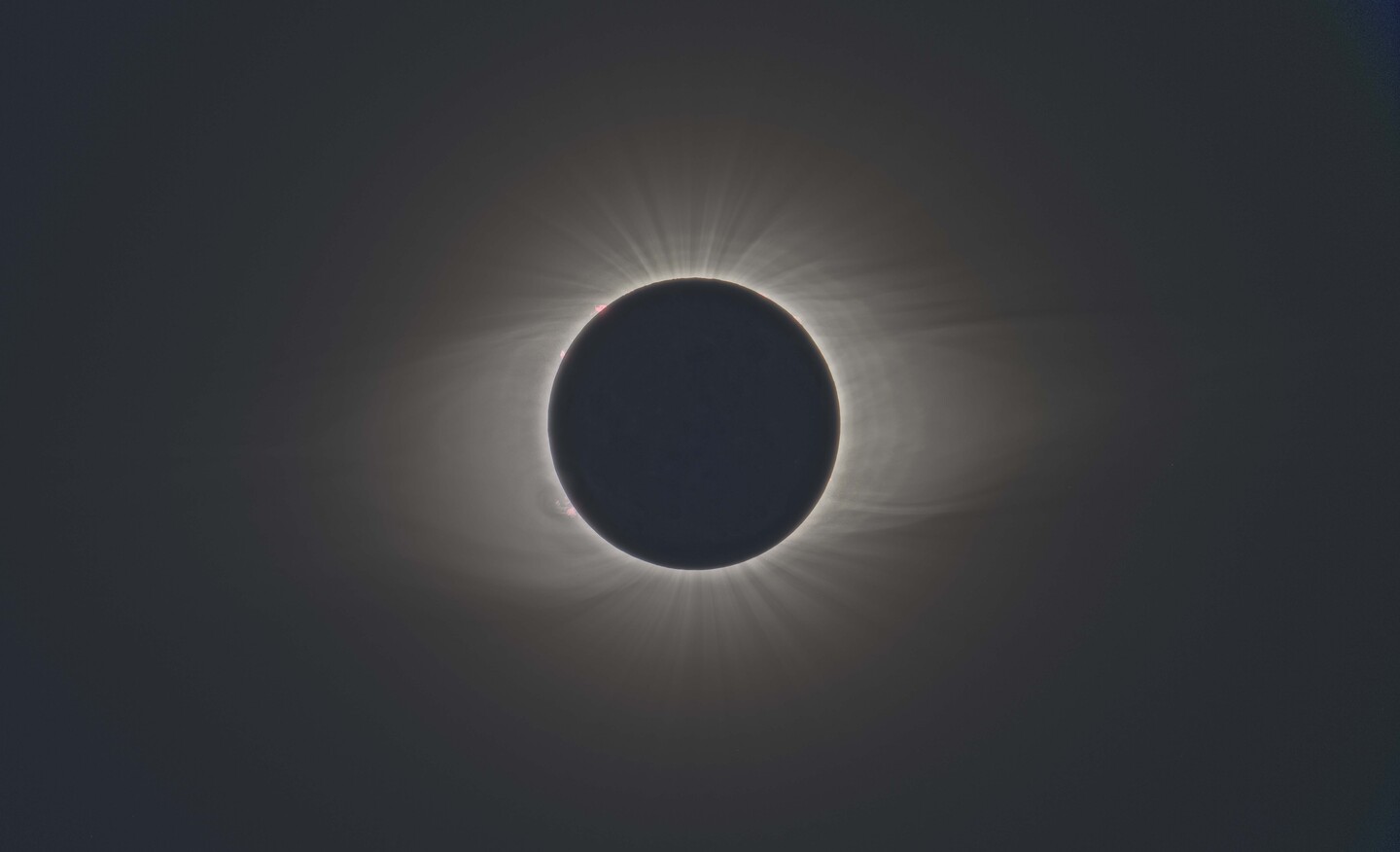 the solar eclipse surrounded by its corona