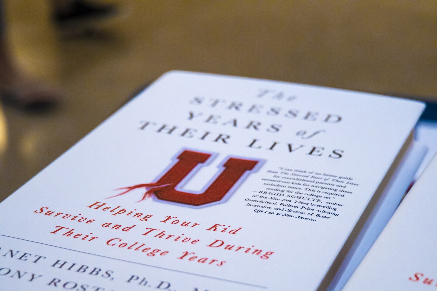 Book cover that reads The Stressed Years of Their Lives: Helping Your Kid Survive and Thrive During Their College Years