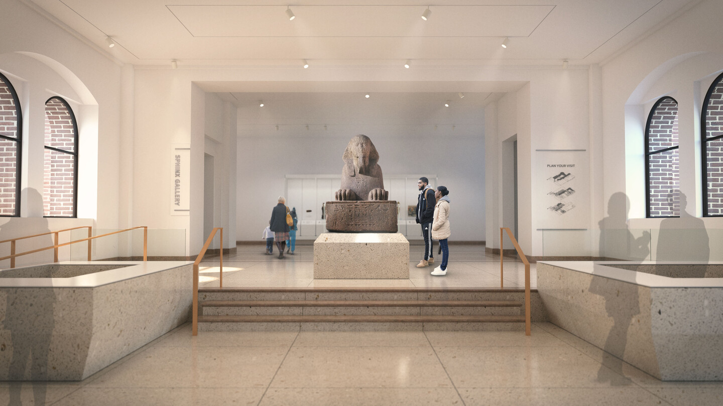 Sphinx positioned as centerpiece of room with lights illuminating it
