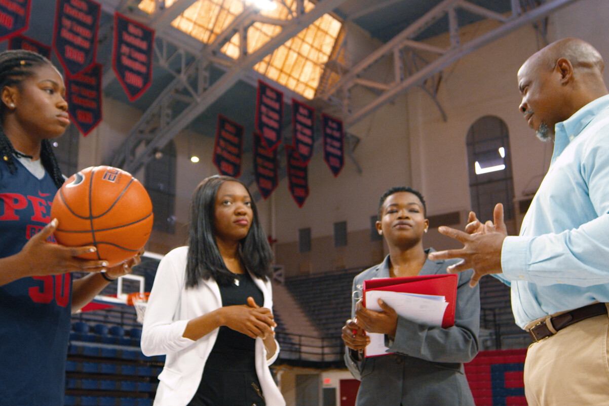rebound liberia mentor in the basketball court