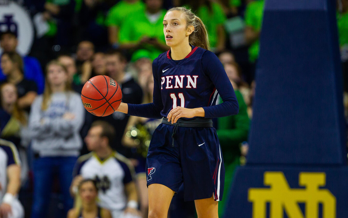 Senior guard Kendall Grasela dribbles the ball up the court.