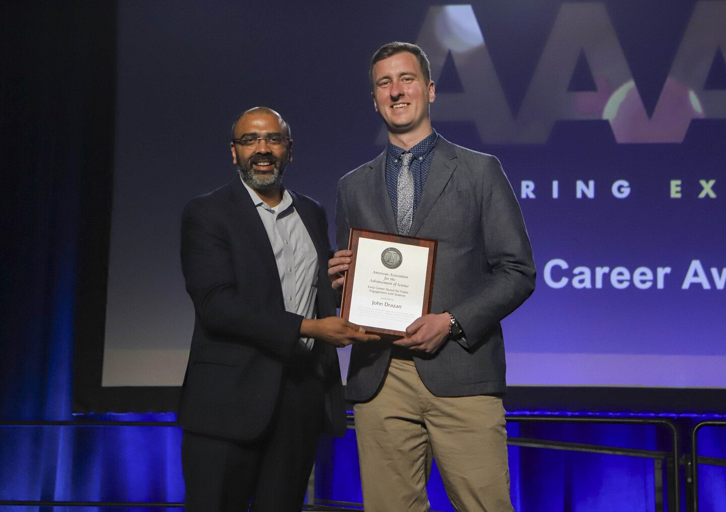 john drazan receiving an award 