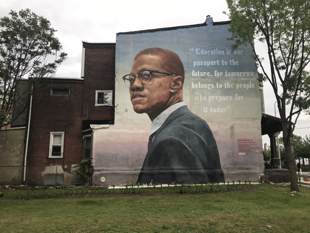 A mural of Malcolm X by former Penn student&nbsp;Ernel Martinez at Diamond Street and Ridge Avenue in Strawberry Mansion.