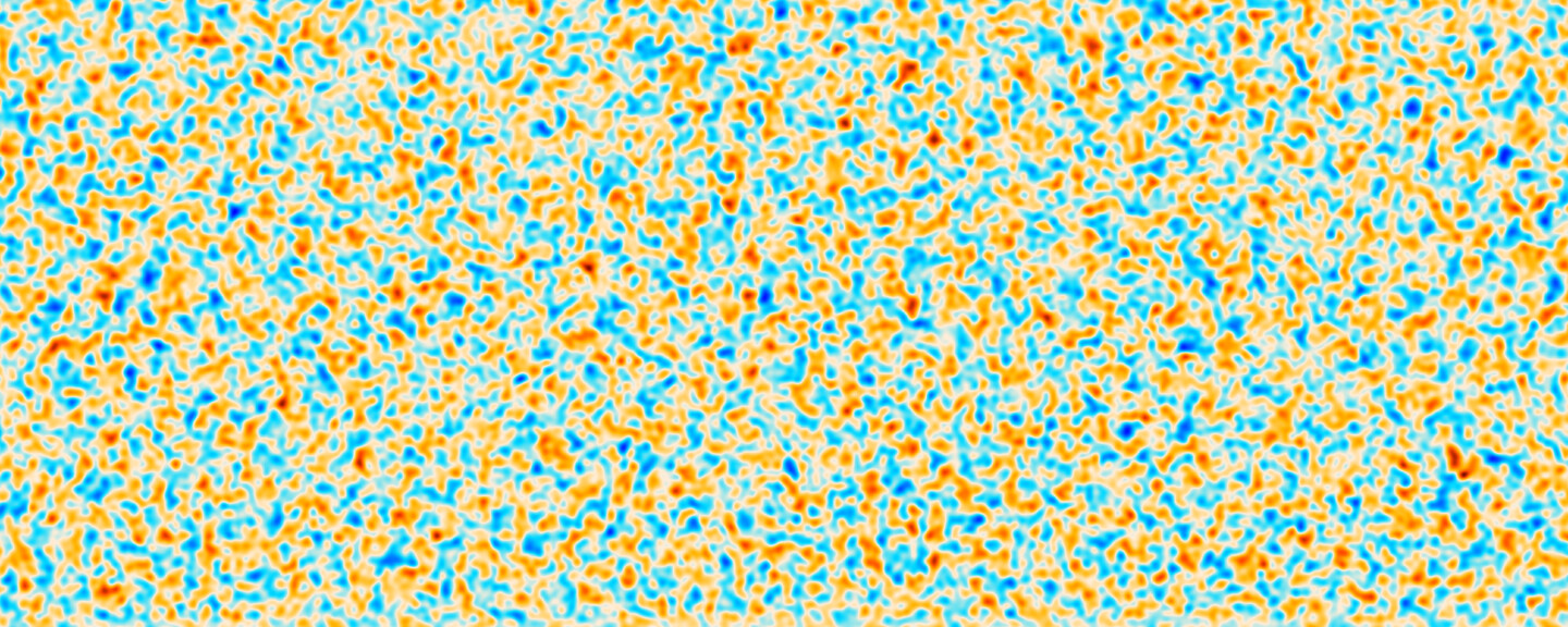 an image of the cosmic microwave background, showing variations in polarization as shades of orange and blue