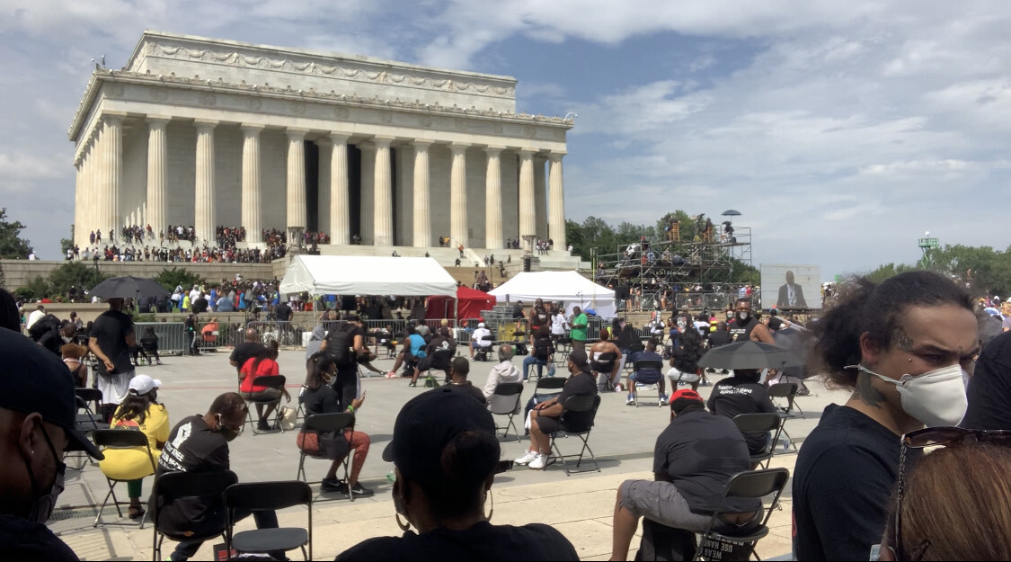 Attendees socially distance while listening to speakers at the 2020 March on Washington.