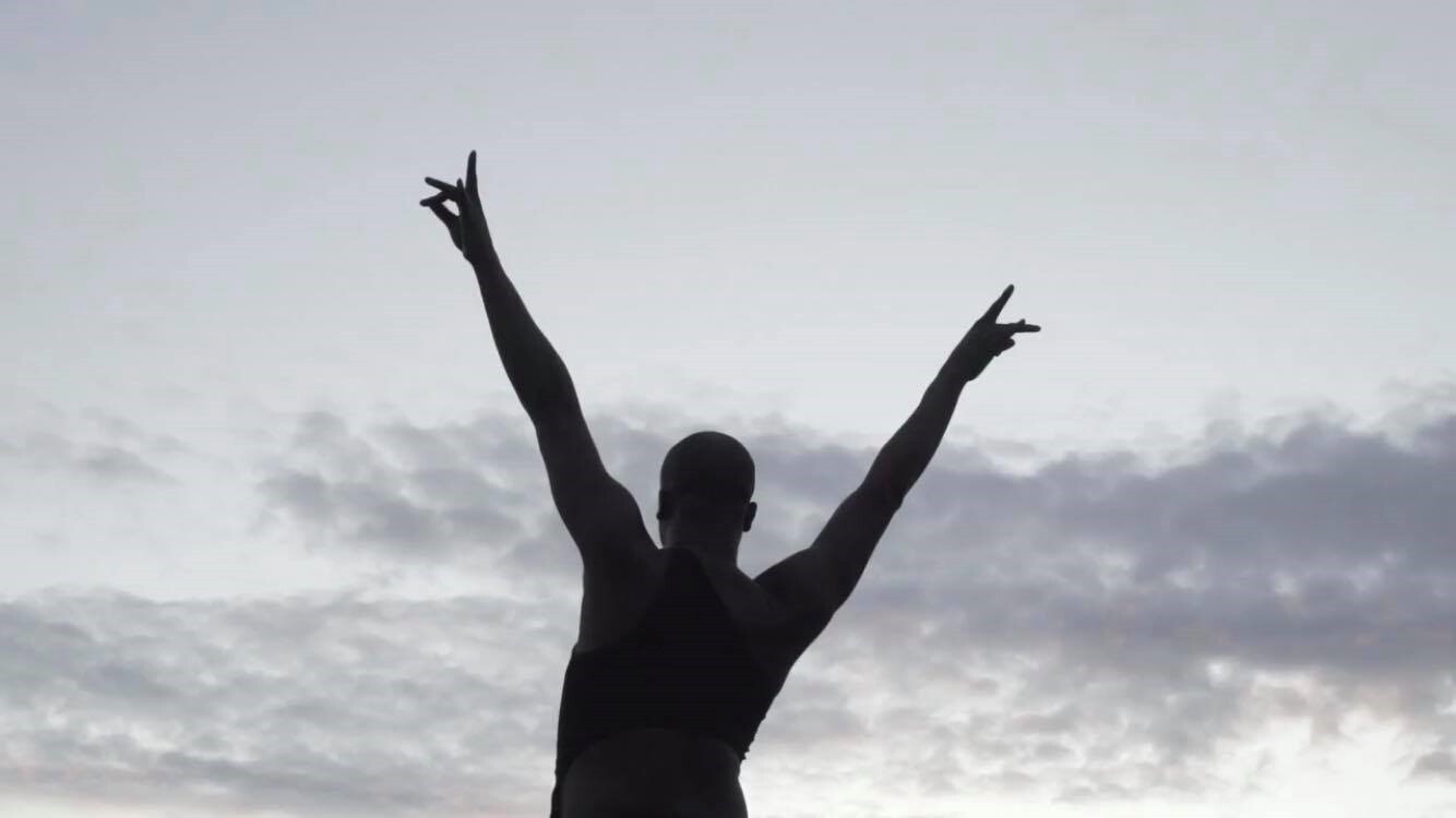 Arien Wilkerson's silhouette set against cloudy sky