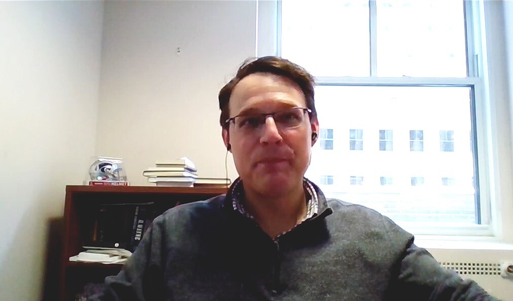 Zoom event captured Steve Kornacki at a remote desk.