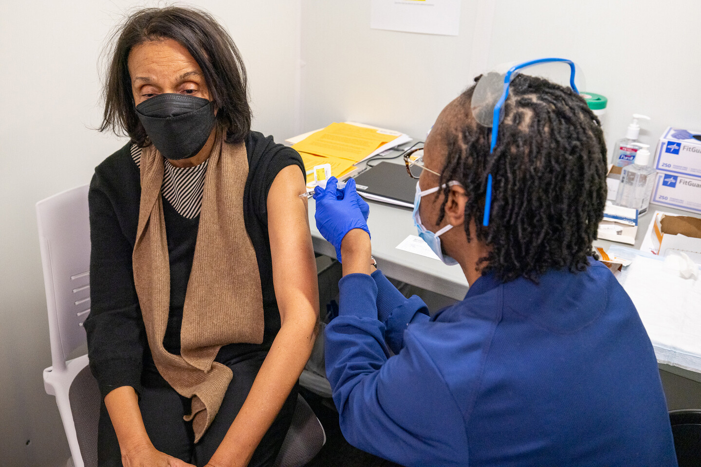 patient getting covid vaccine
