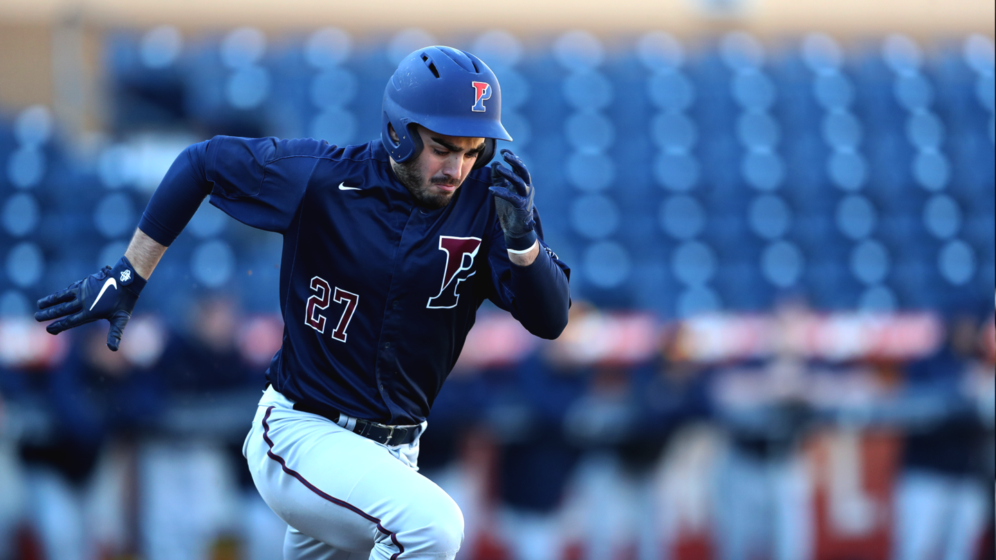 Tommy Courtney sprints to the base during a game.