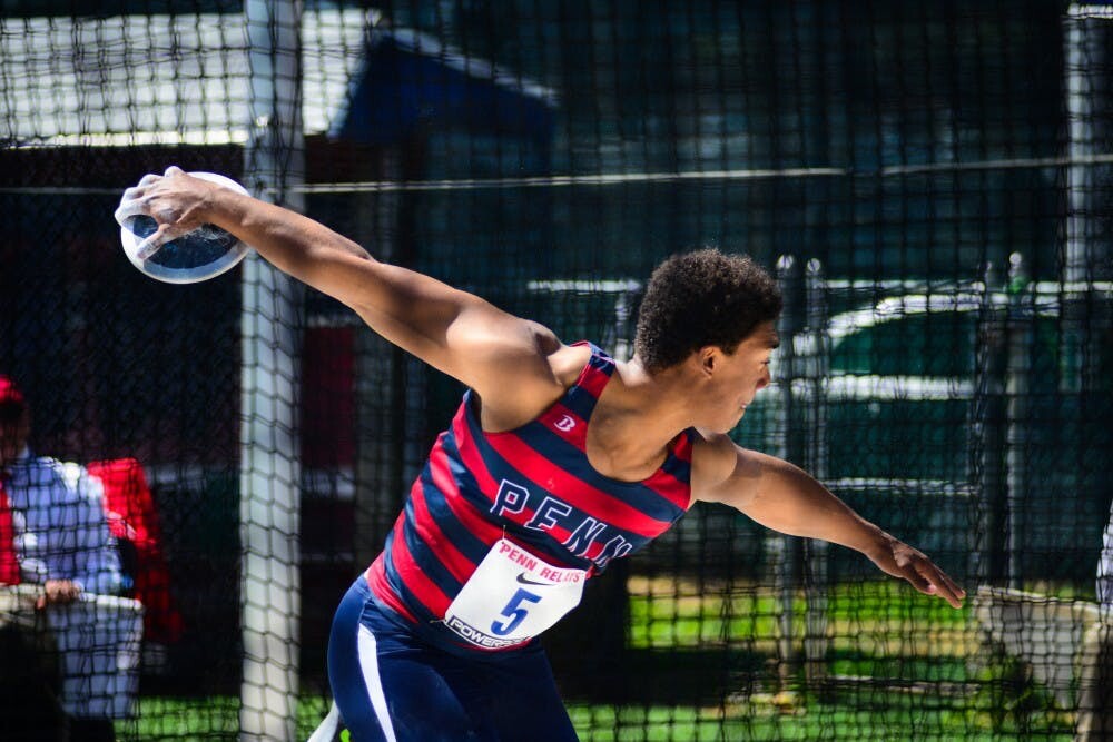Mattis prepares to throw the discus during his days at Penn.