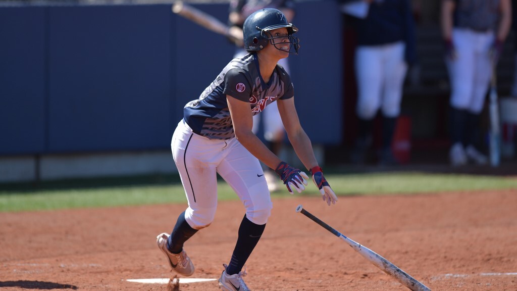Leah Allen softball player dropping the bat and leaving home base
