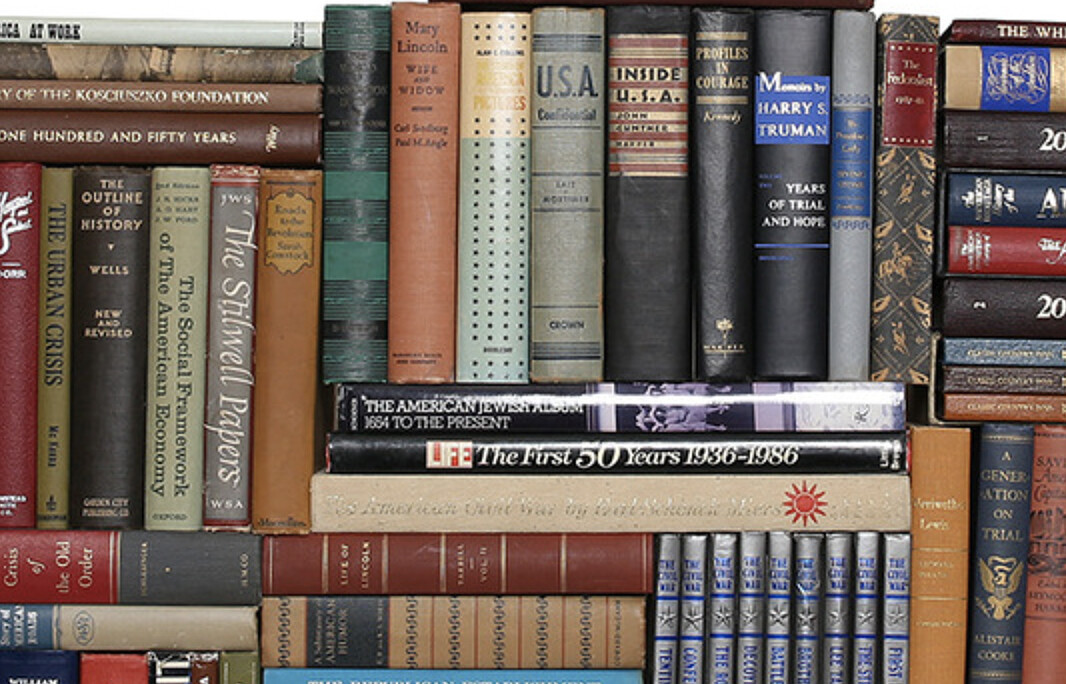 Books about U.S. history are stacked on top of one another
