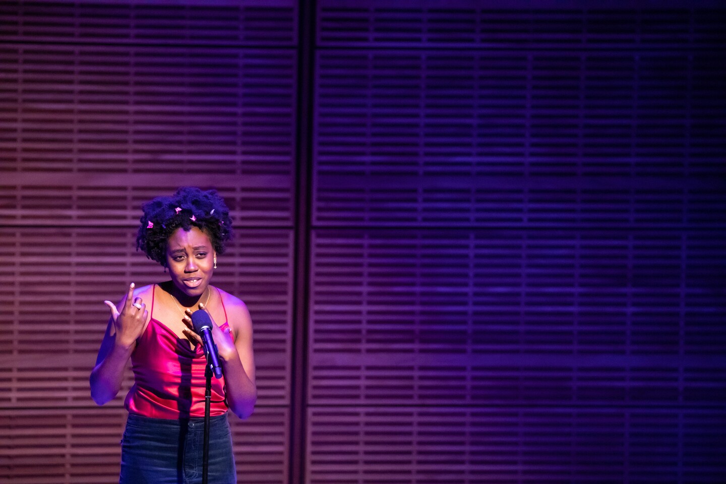 student speaking on stage 