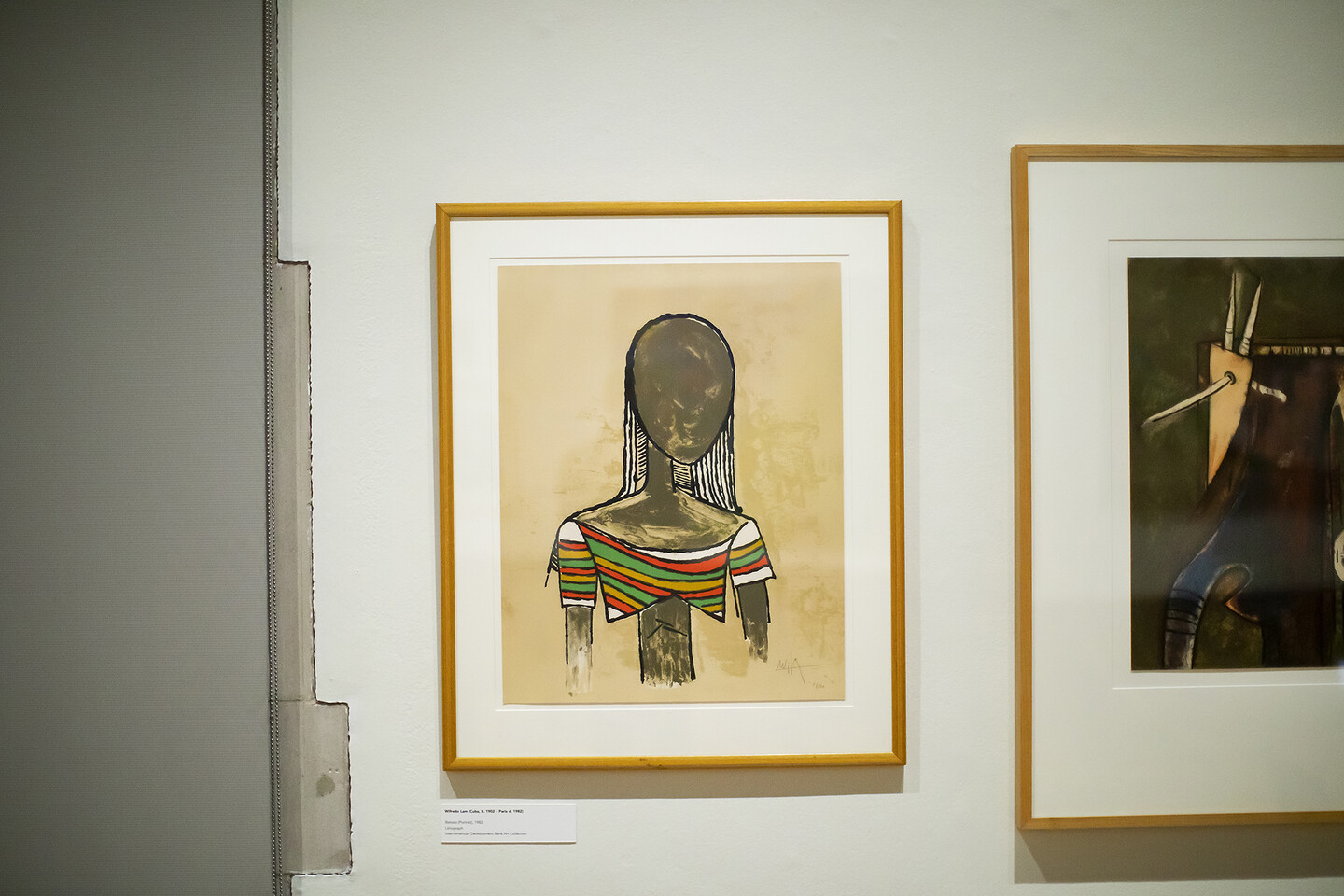 two artworks on a wall 