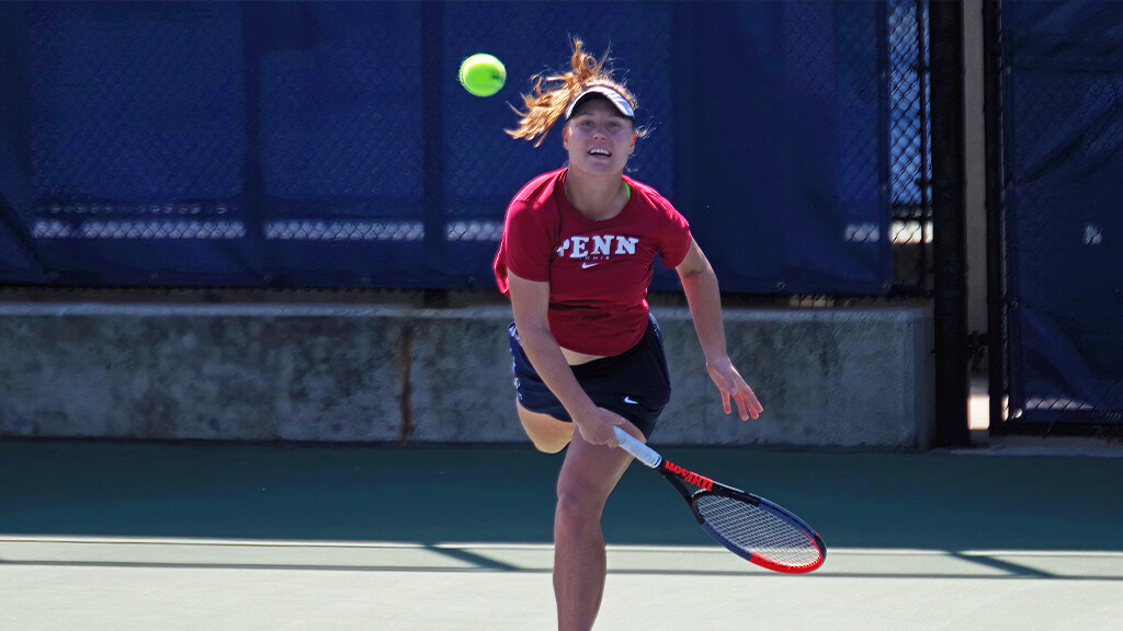 Bryzgalova watches the ball after completing her serve.