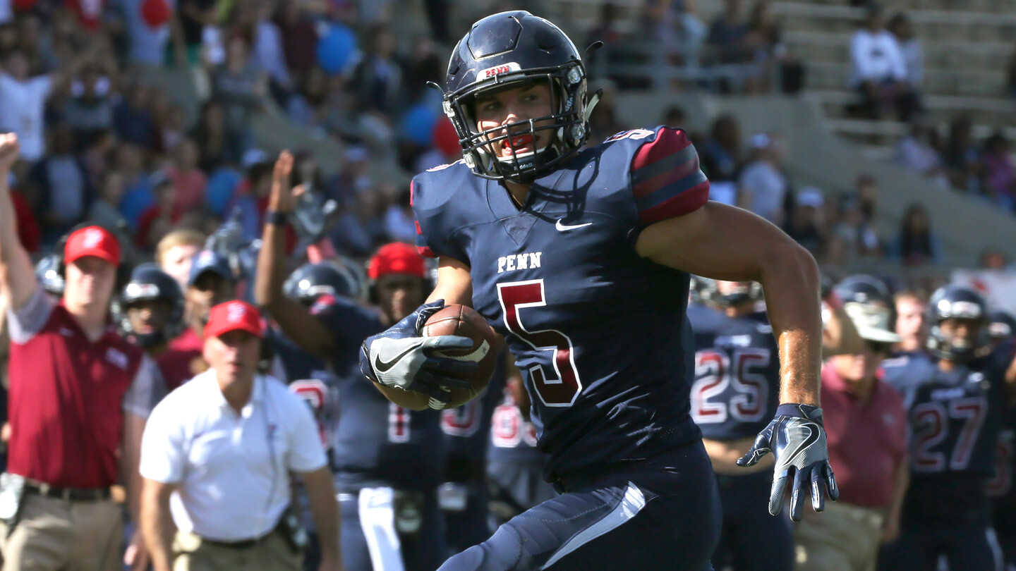 Watson runs with the ball during his Penn days.