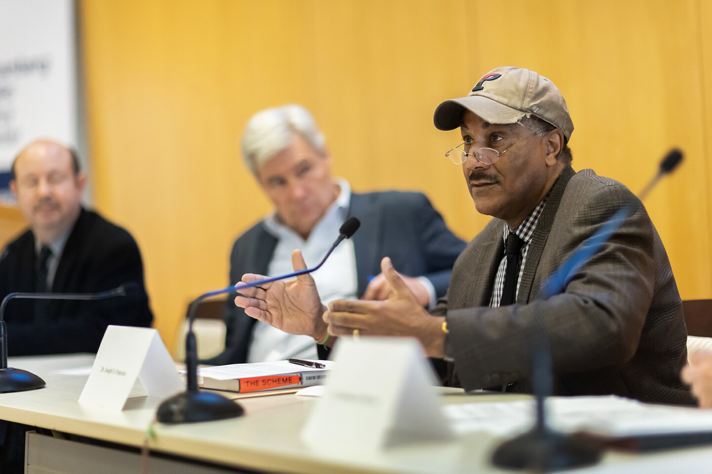 Joseph Francisco speaks at a panel. 