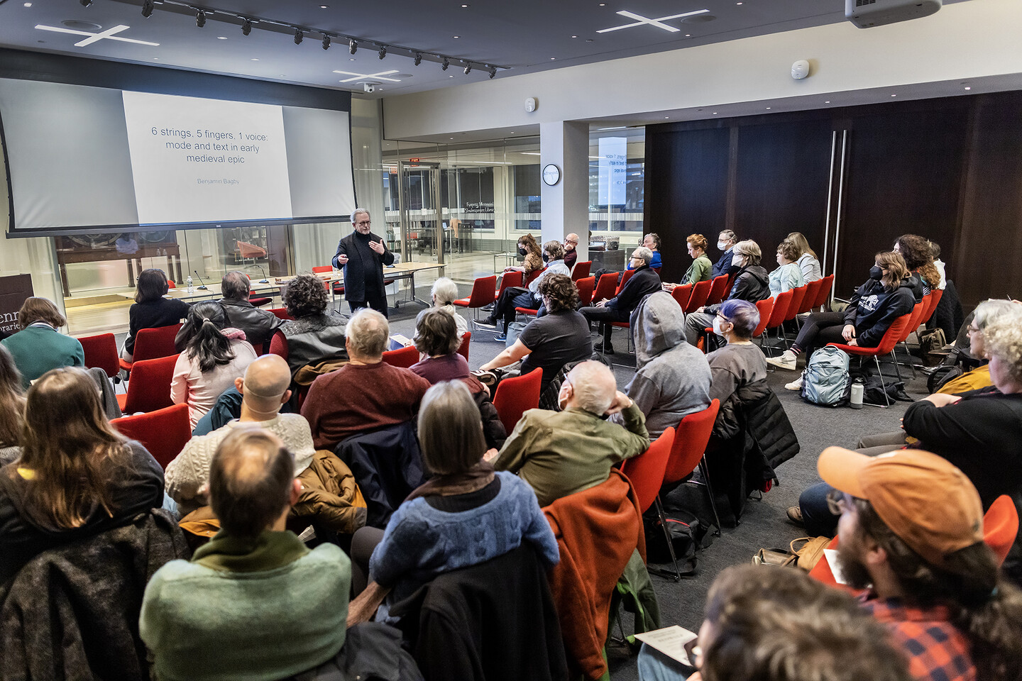 Benjamin Bagby stands in front of an audience at the Penn Libraries. 