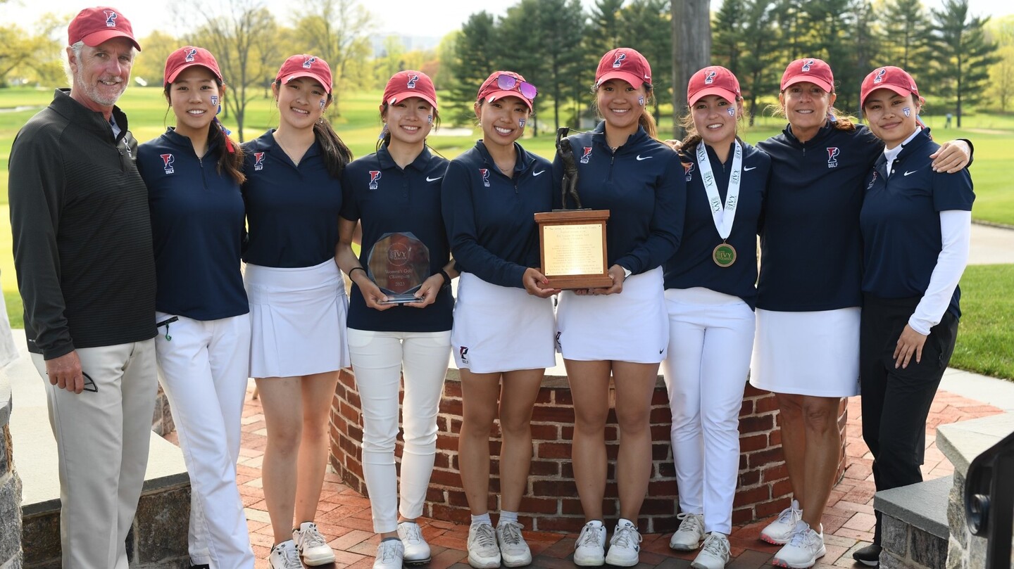 Mark Anderson, left, with the Ivy League champion women’s golf team.