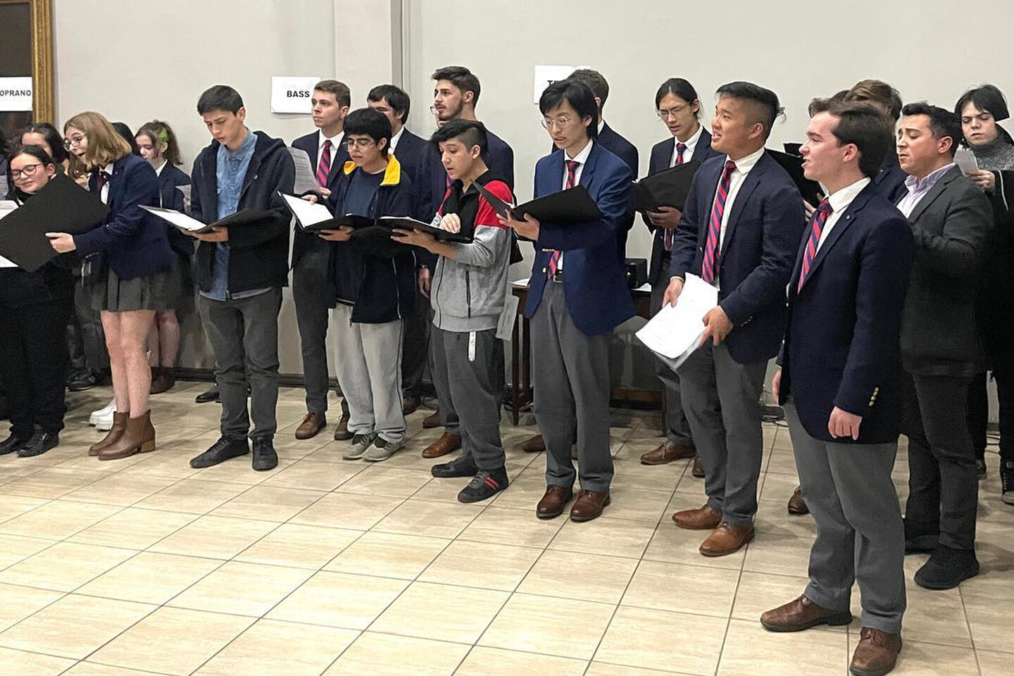 several students standing and singing