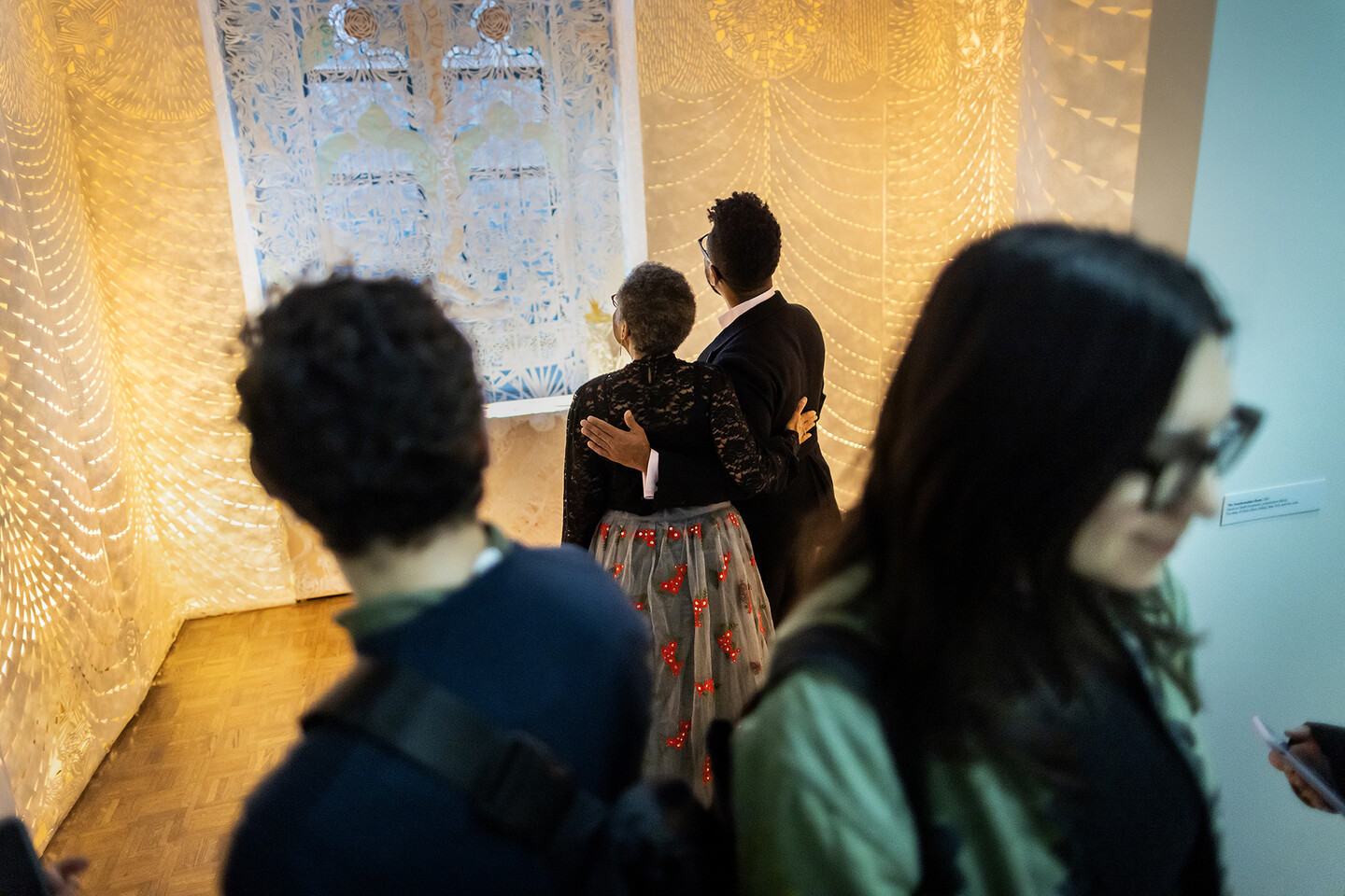 Barbara Earl Thomas viewing artwork
