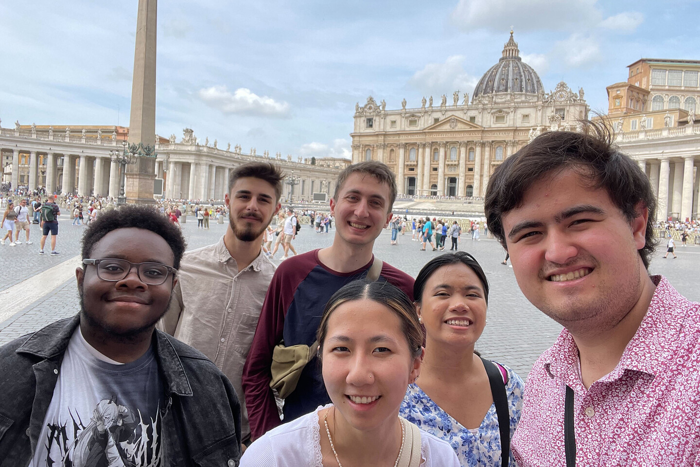 Members of Penn’s Glee Club in a square in an Italian city.