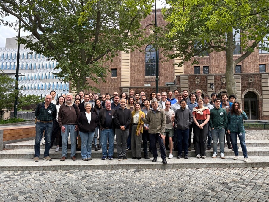 A group of researchers stand outside David Rittenhouse Laboratories at Penn.