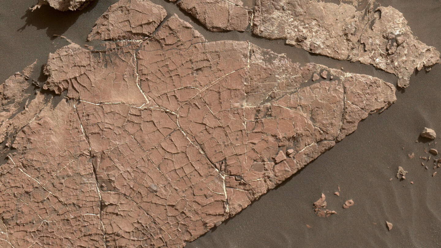 Surface cracks on Mars, which offer geologists clues about the forces shaping planetary surfaces.