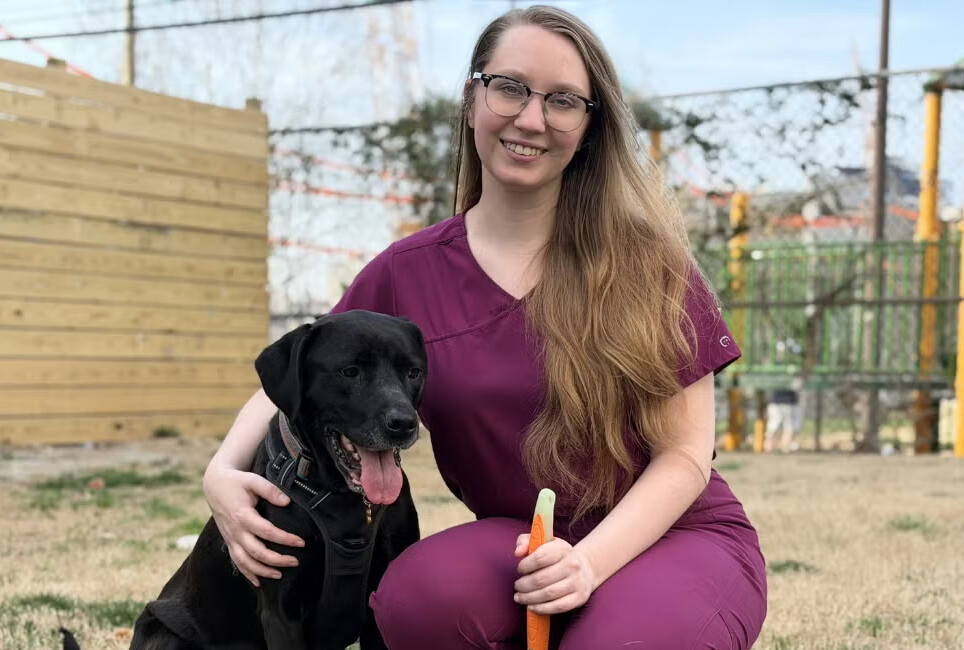 Penn Vet student Alison Kowalski and her Lab mix, Kona.