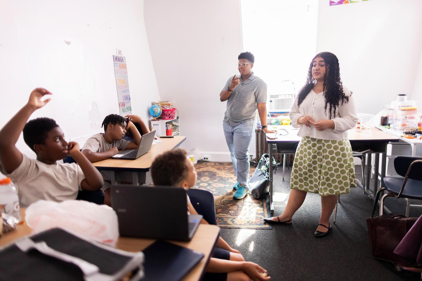 Classroom with two adults and four kids.