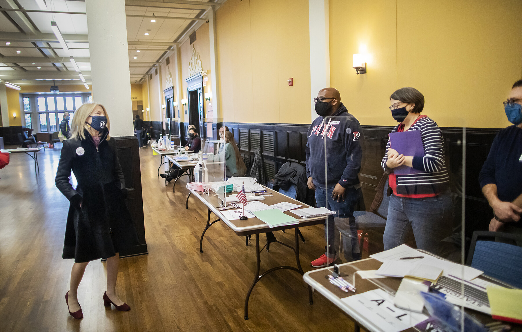 Gutmann greets poll workers at Houston Hall