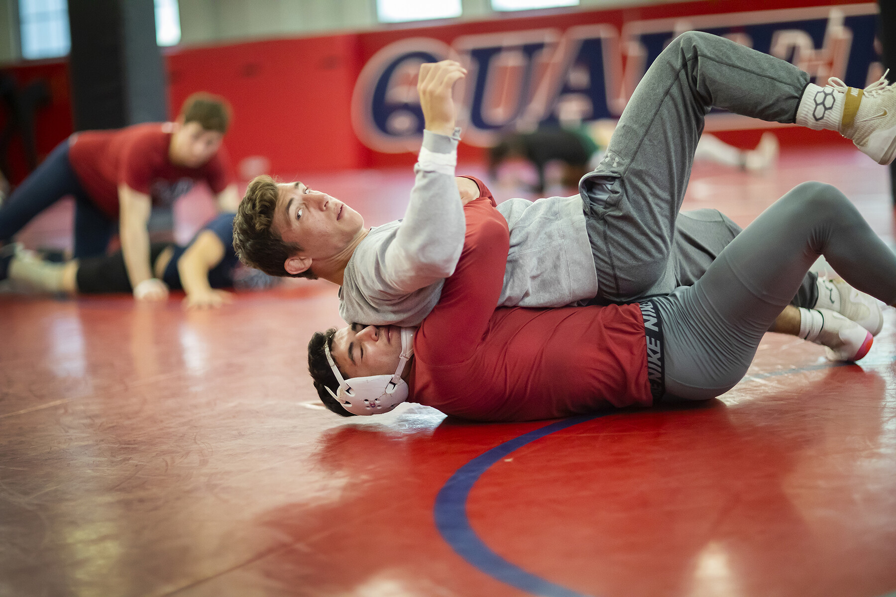 student wrestlers during practice