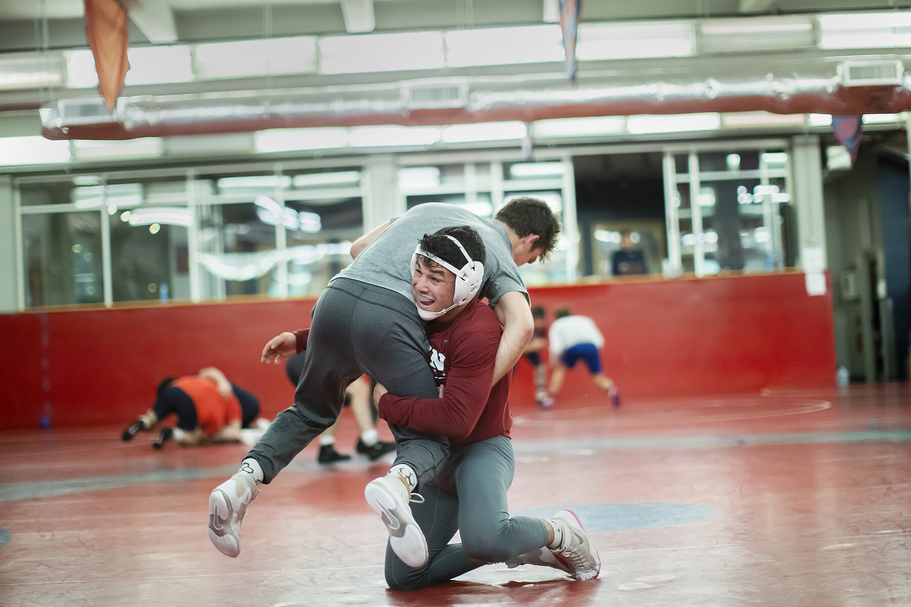 student wrestlers practice