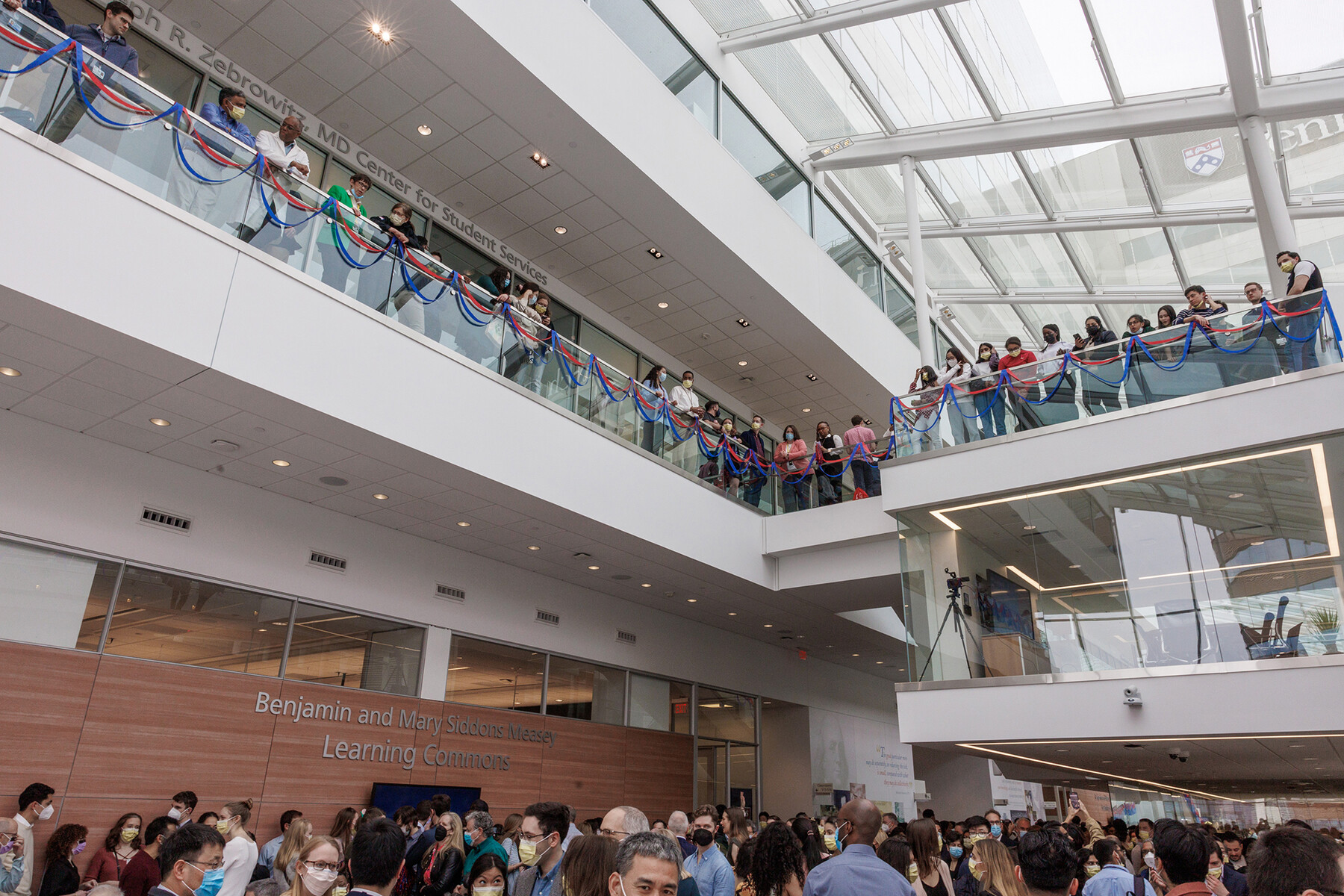 Spectators on the atrium balcony on Penn Med Match Day.