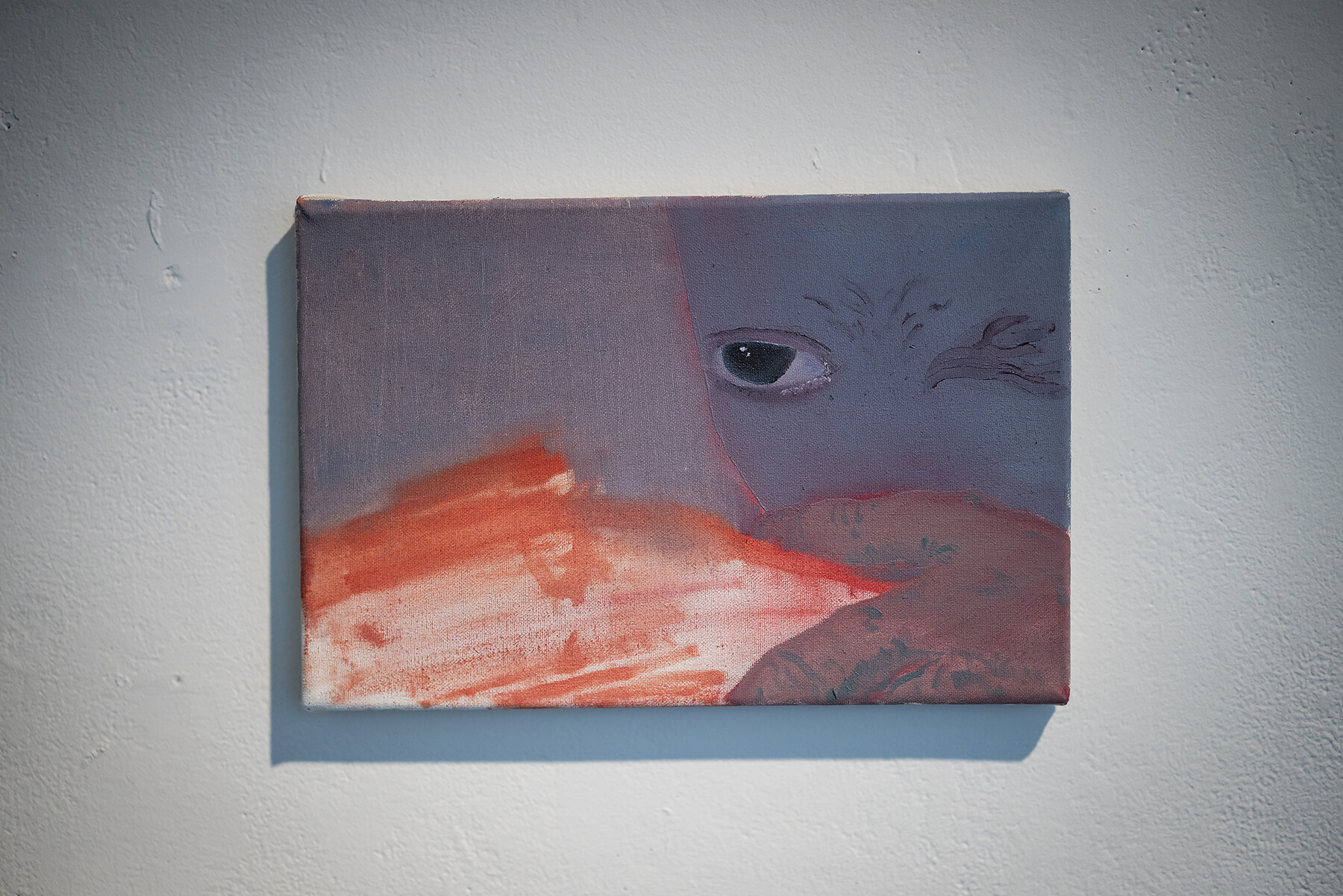 artwork with a neutral background with an eyeball and slash of color