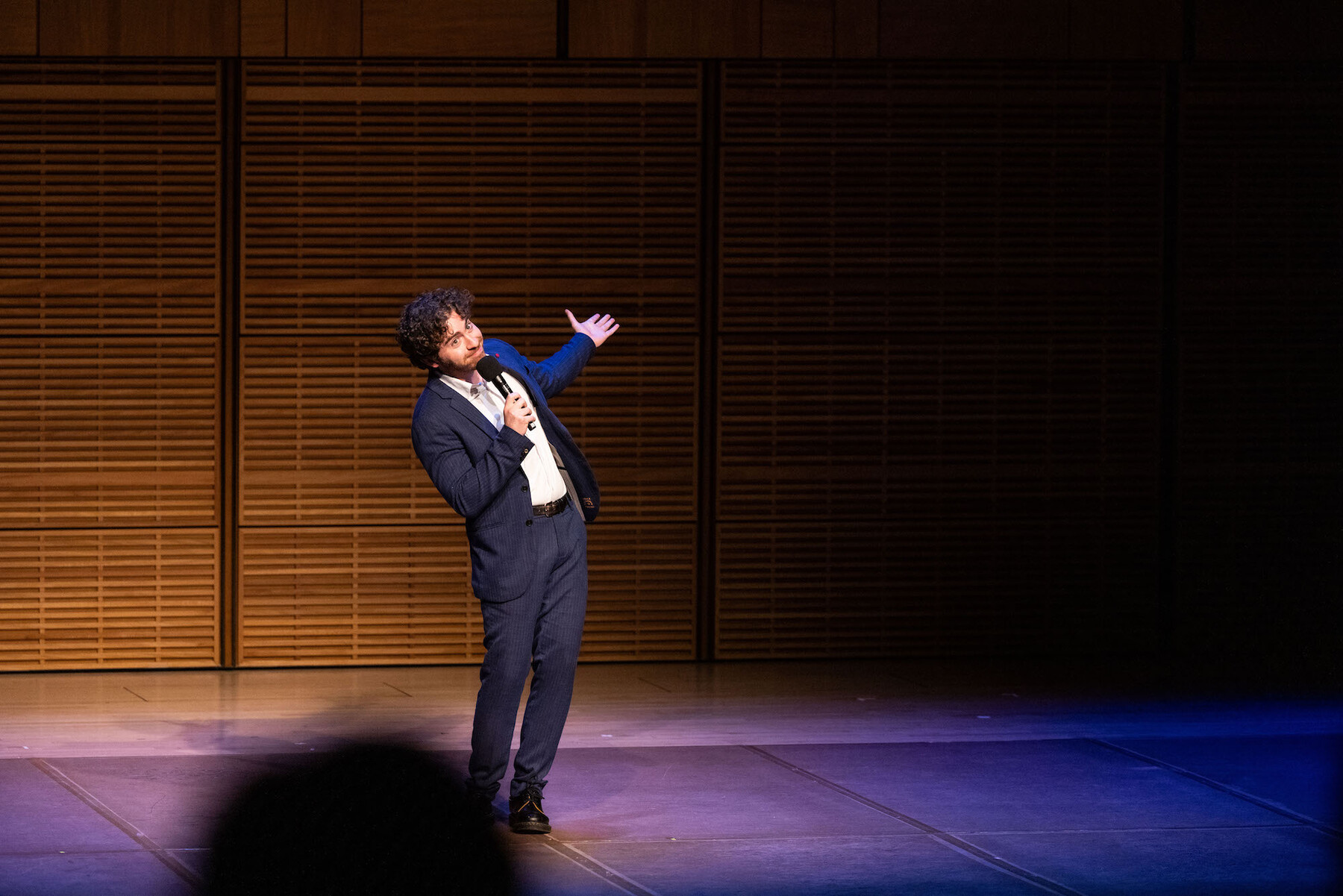 Max Mester performing on stage at Carnegie Hall.