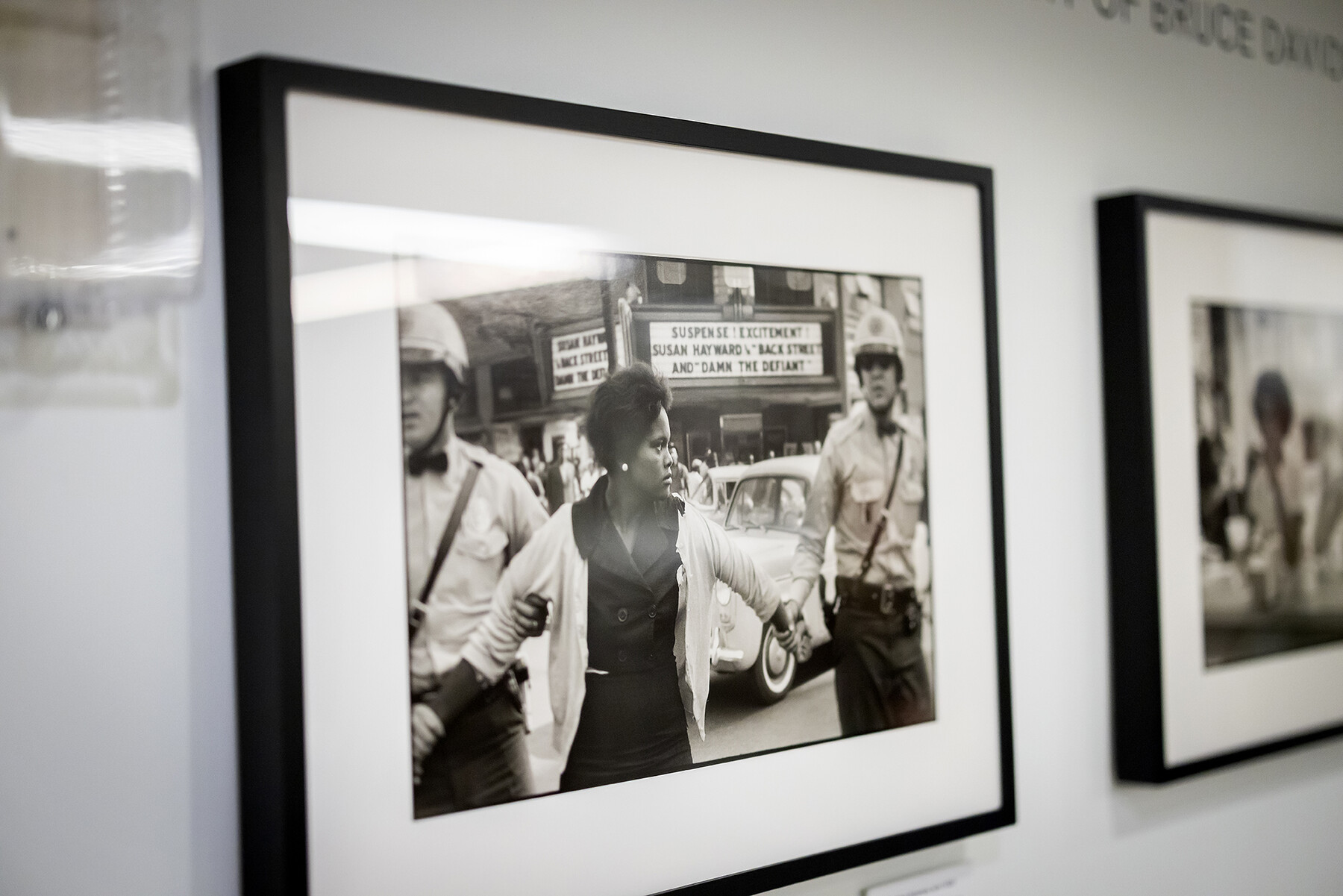 A photo by photographer Bruce Davidson on a gallery wall in Penn Libraries.