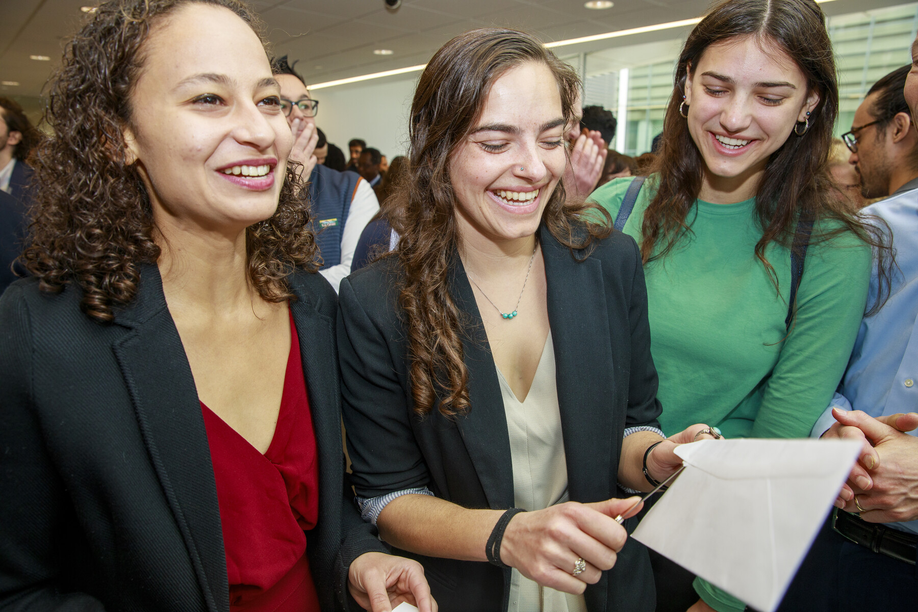 A Penn Med student opens their Match Day envelope.