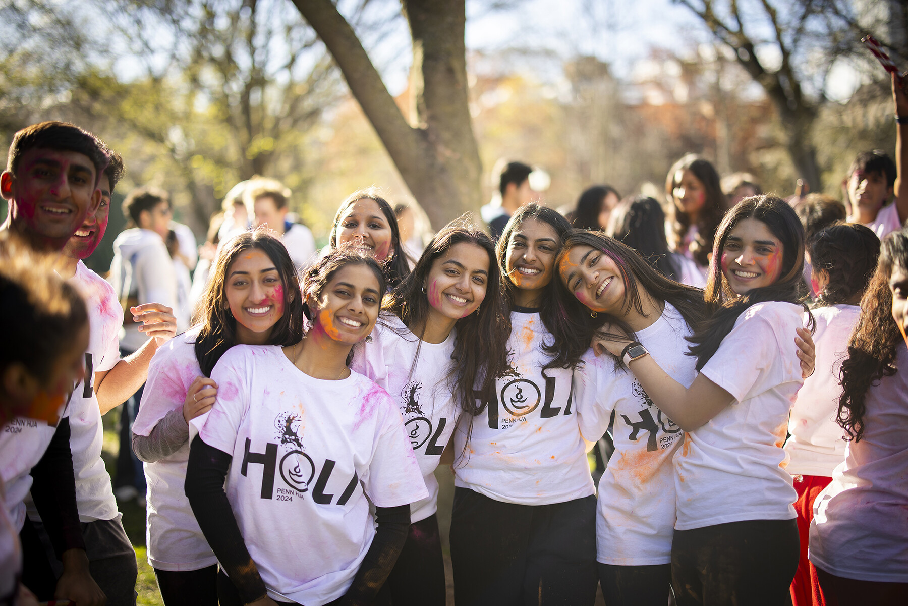 Penn students pose for a photo on College Green during Penn’s Holi celebration.